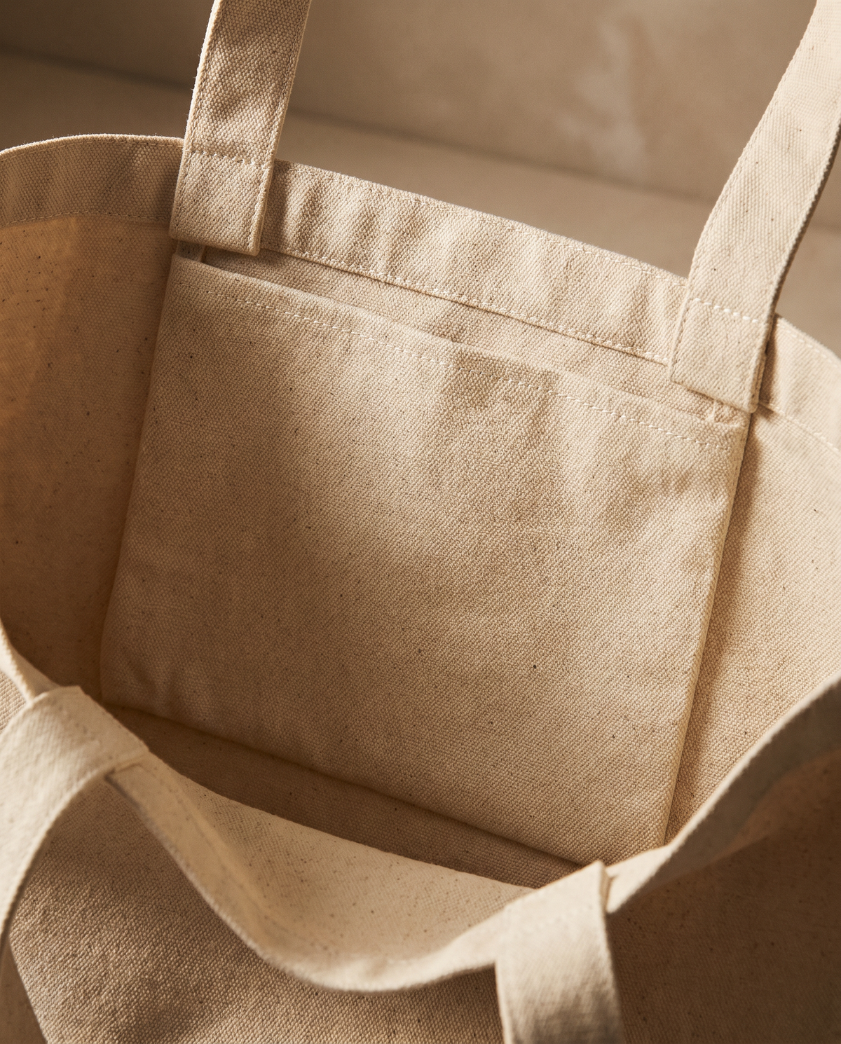 Close-up of the Organic Cotton Tote's interior pocket