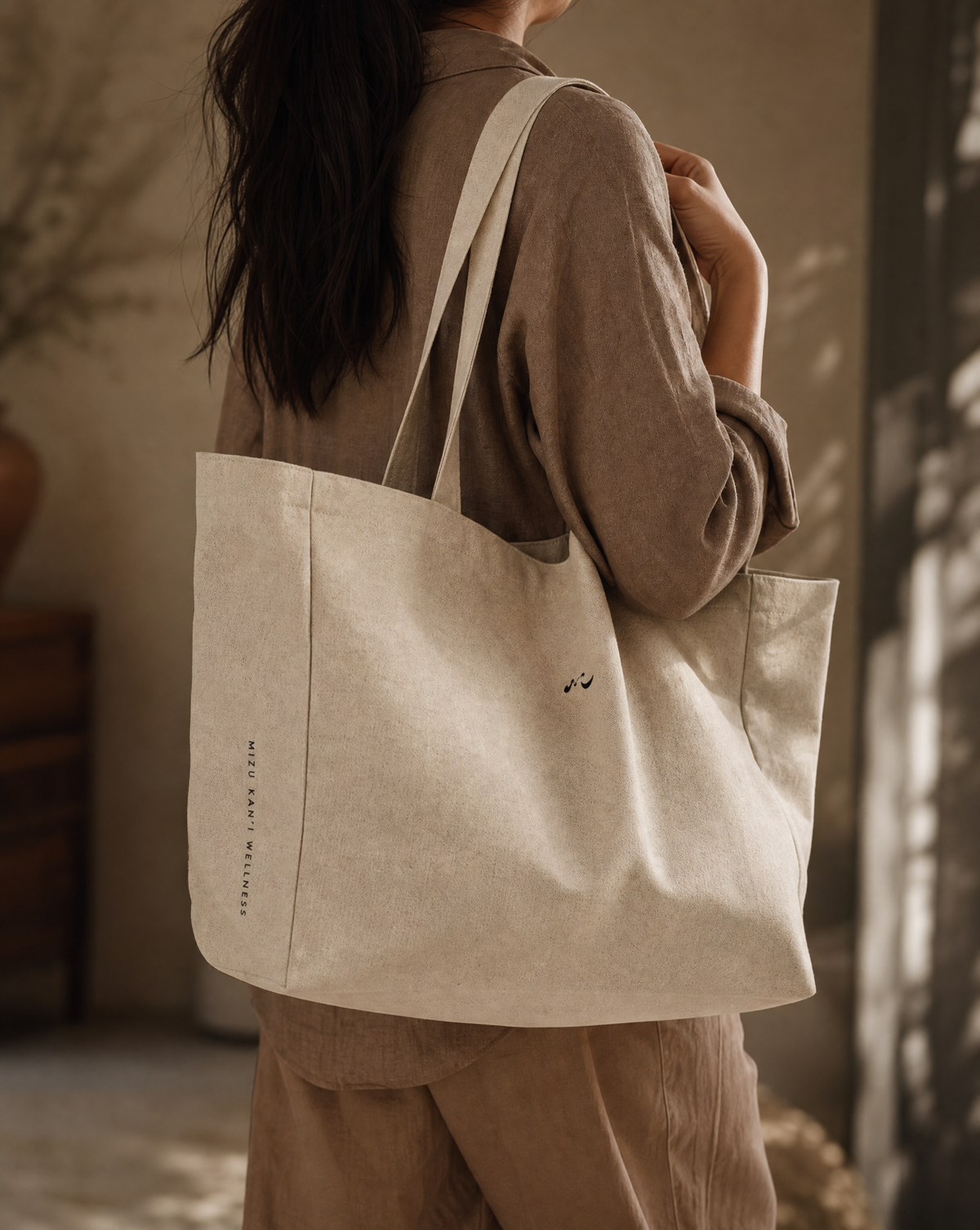 The Organic Cotton Tote carried over the shoulder